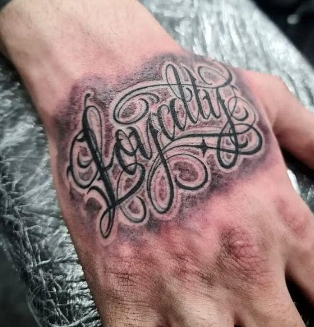 Shadowed Hand Loyalty Tattoo