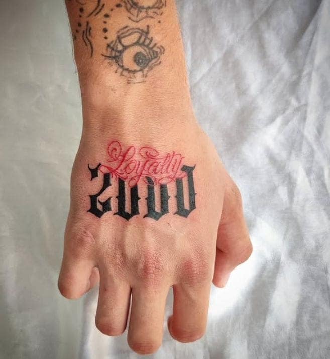 Loyalty Over Good Hand Tattoo