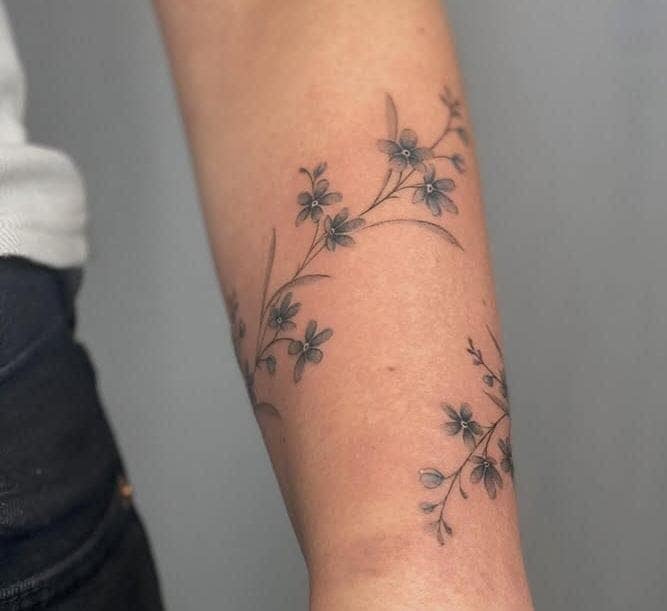 Delicate Wildflower Wrist Wrap Tattoo