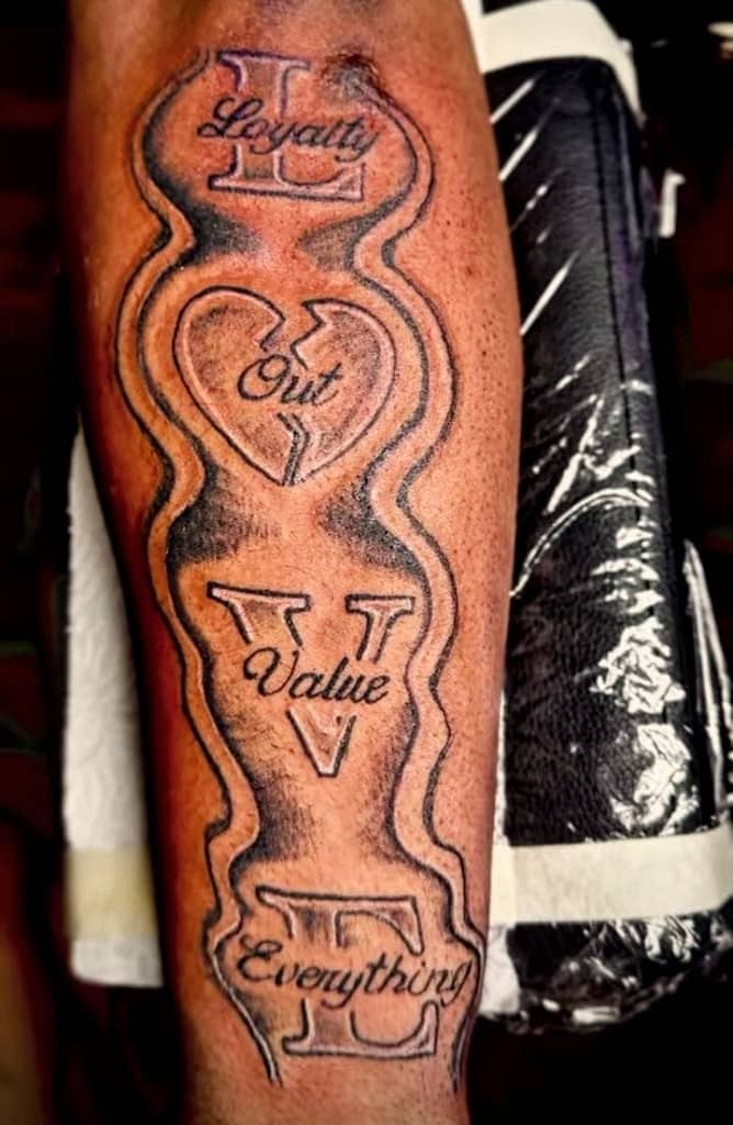 LIVE Loyalty Out Value Everything Forearm Tattoo 