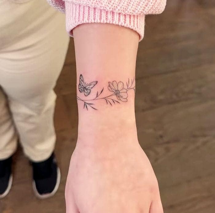 Dainty Wildflower Chain Tattoo