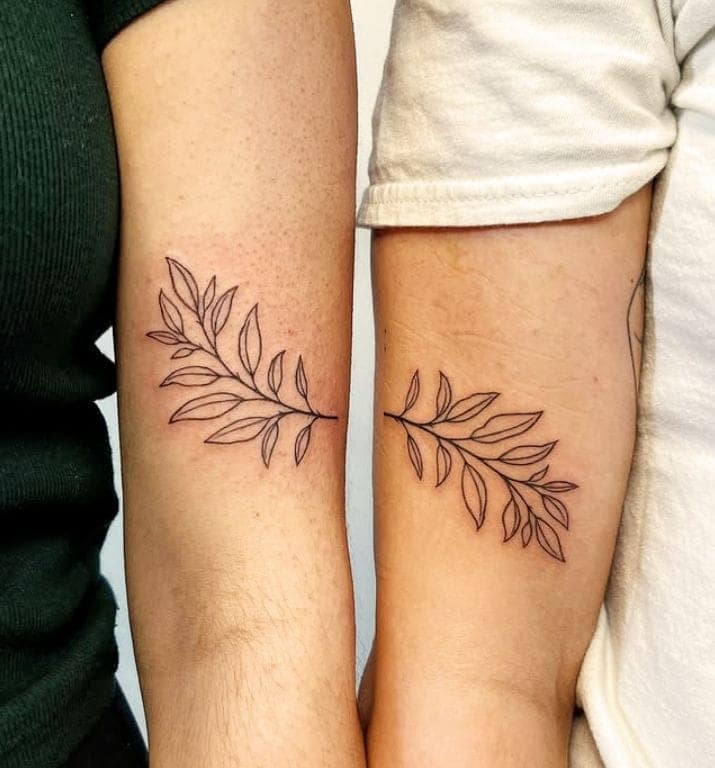 Complementary Olive Branch Sister Tattoos