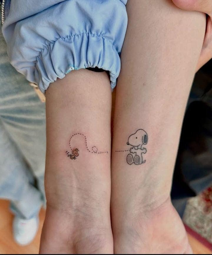 Snoopy and Woodstock Sister Tattoos