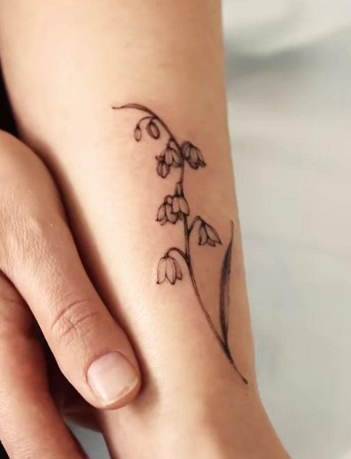 Tiny Bellflower Hand Tattoo