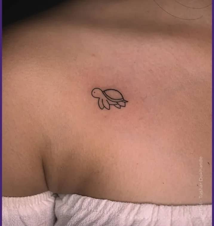 Delicate Chest Outline Turtle: Minimalist Ocean Inspiration