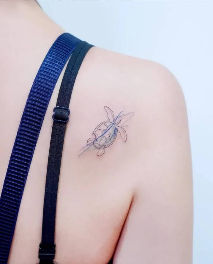 Shoulder Outline Turtle: Fine-Line Feminine Design
