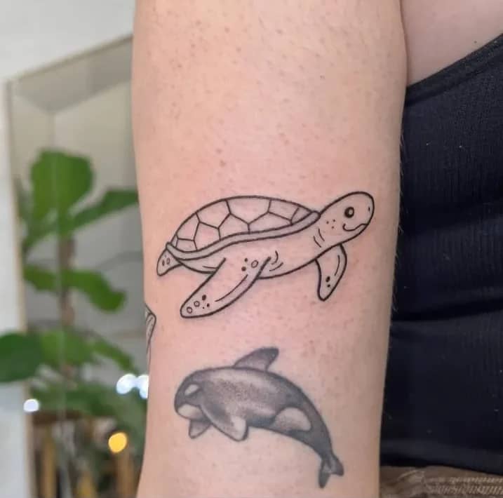 Forearm Turtle with Dolphin: Ocean Wildlife Duo Design