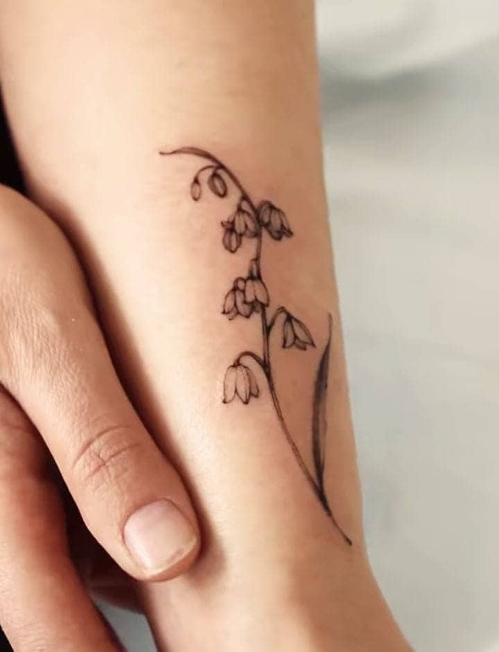 Tiny Bellflower Hand Tattoo 
