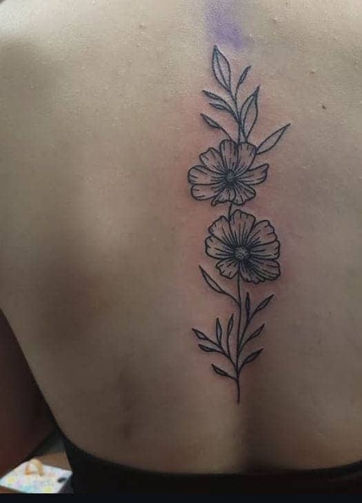 Simple Poppy Spine Tattoo
