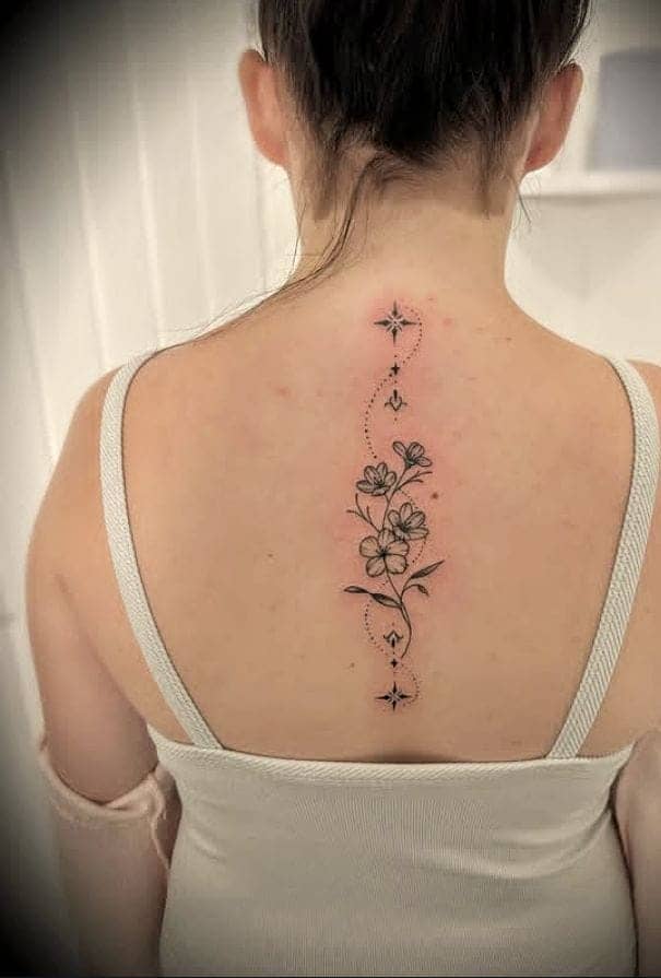 Butterfly and Lily Spine Tattoo
