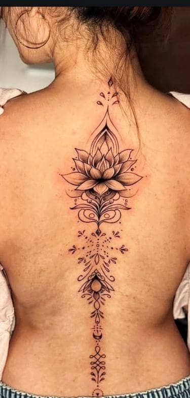 Ornate Lotus Mandala Spine Tattoo