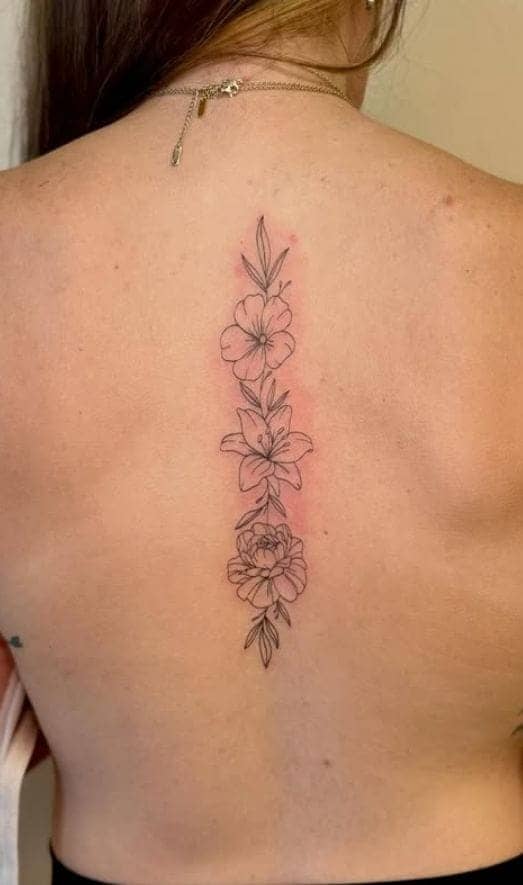 Mixed Floral Vertical Spine Tattoo