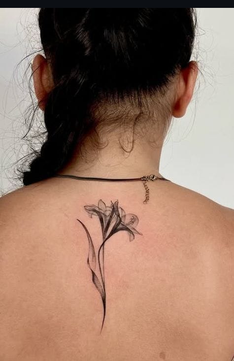 Minimalist Iris Flower Upper Back Tattoo