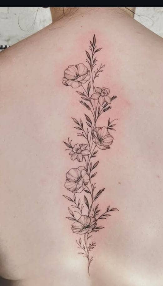 Serenity Lotus Spine Tattoo