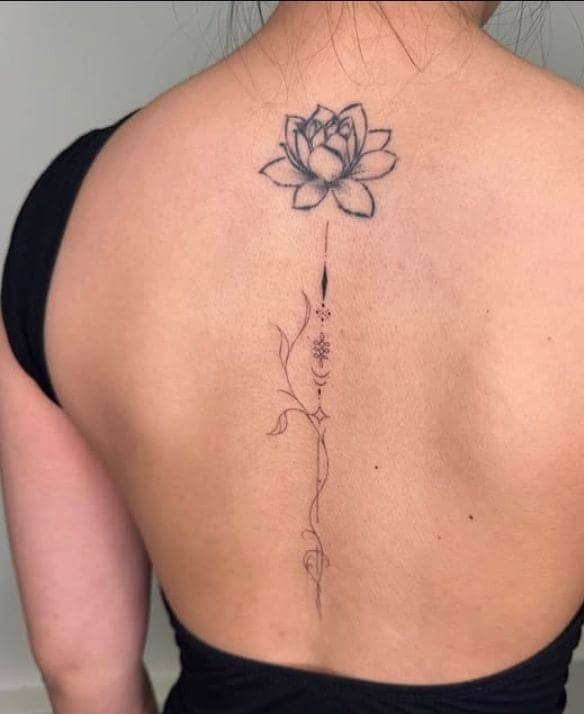 Lotus Flower with Script Spine Tattoo