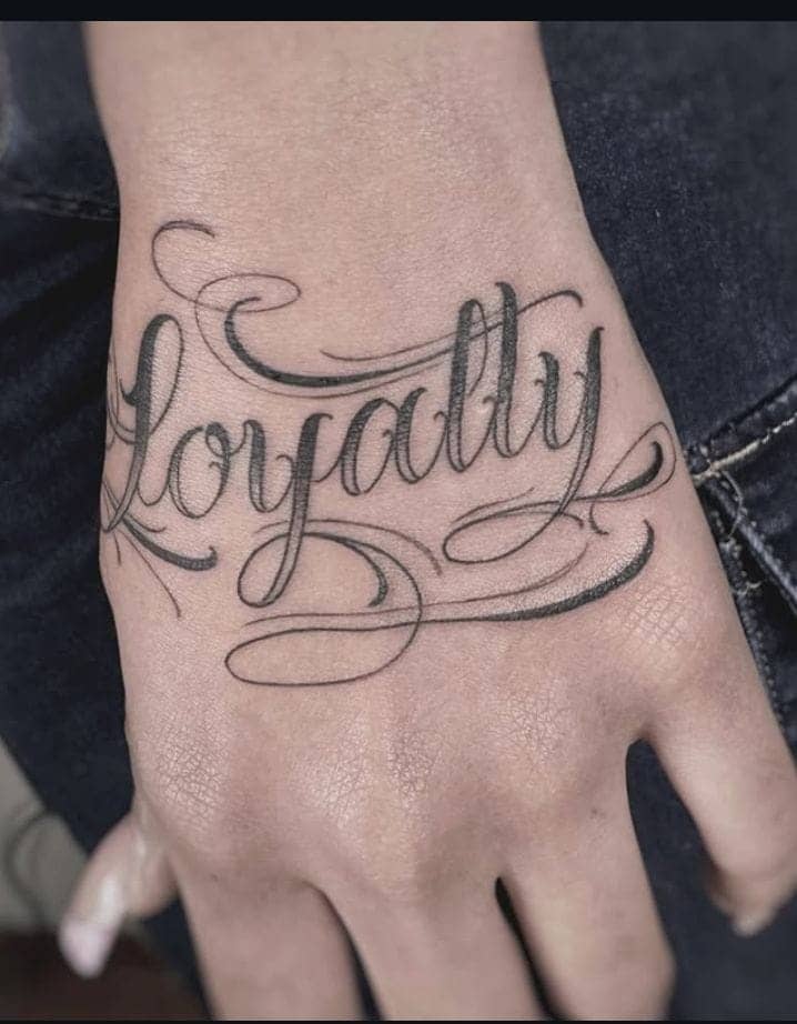 Hand Loyalty Script Tattoo 