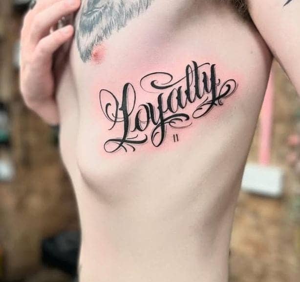 Ribcage Script Loyalty Tattoo 